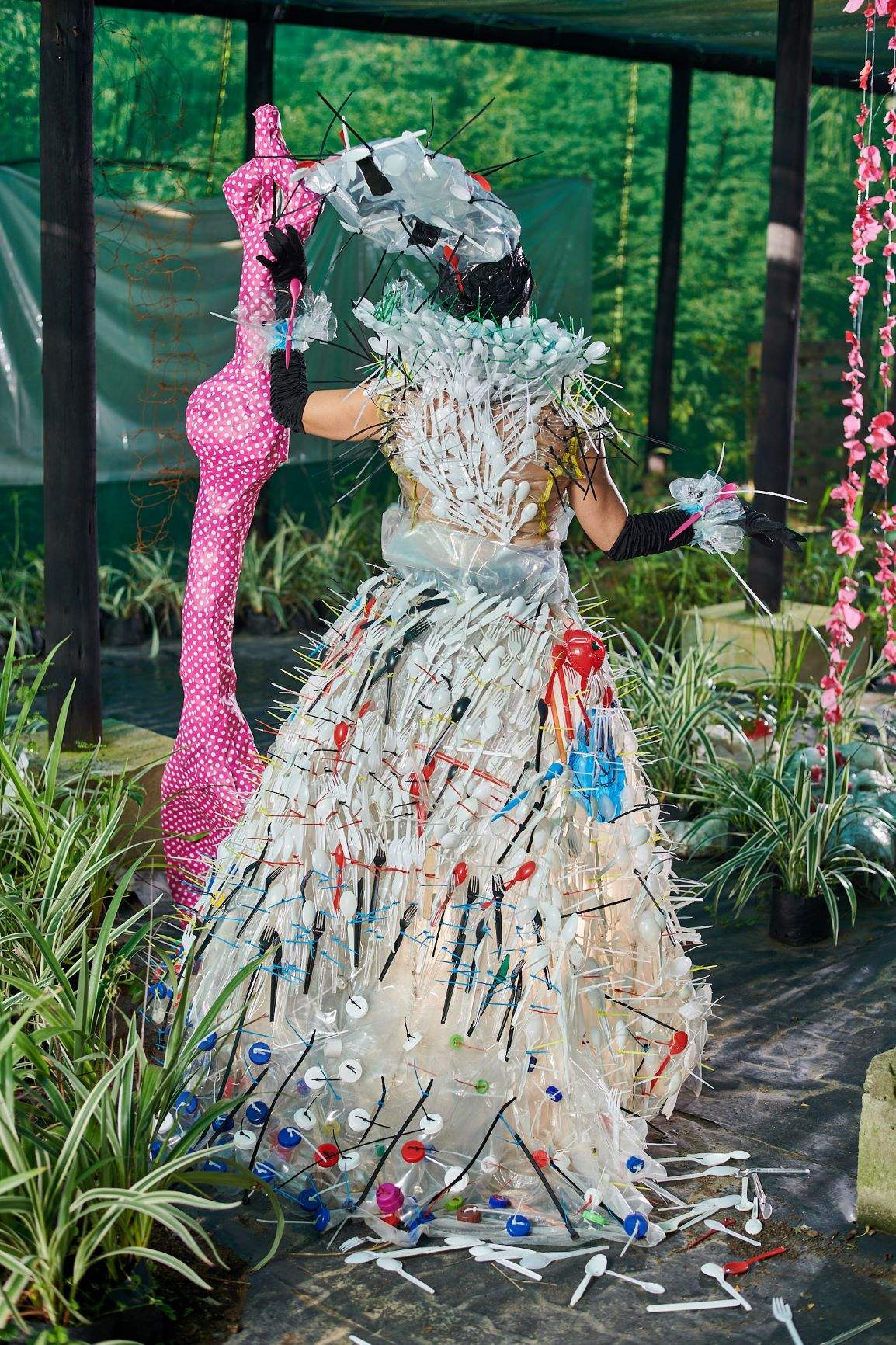 Medium: Discarded plastic spoons (some knives and forks) collected from beaches, family and friends on plastic sheeting